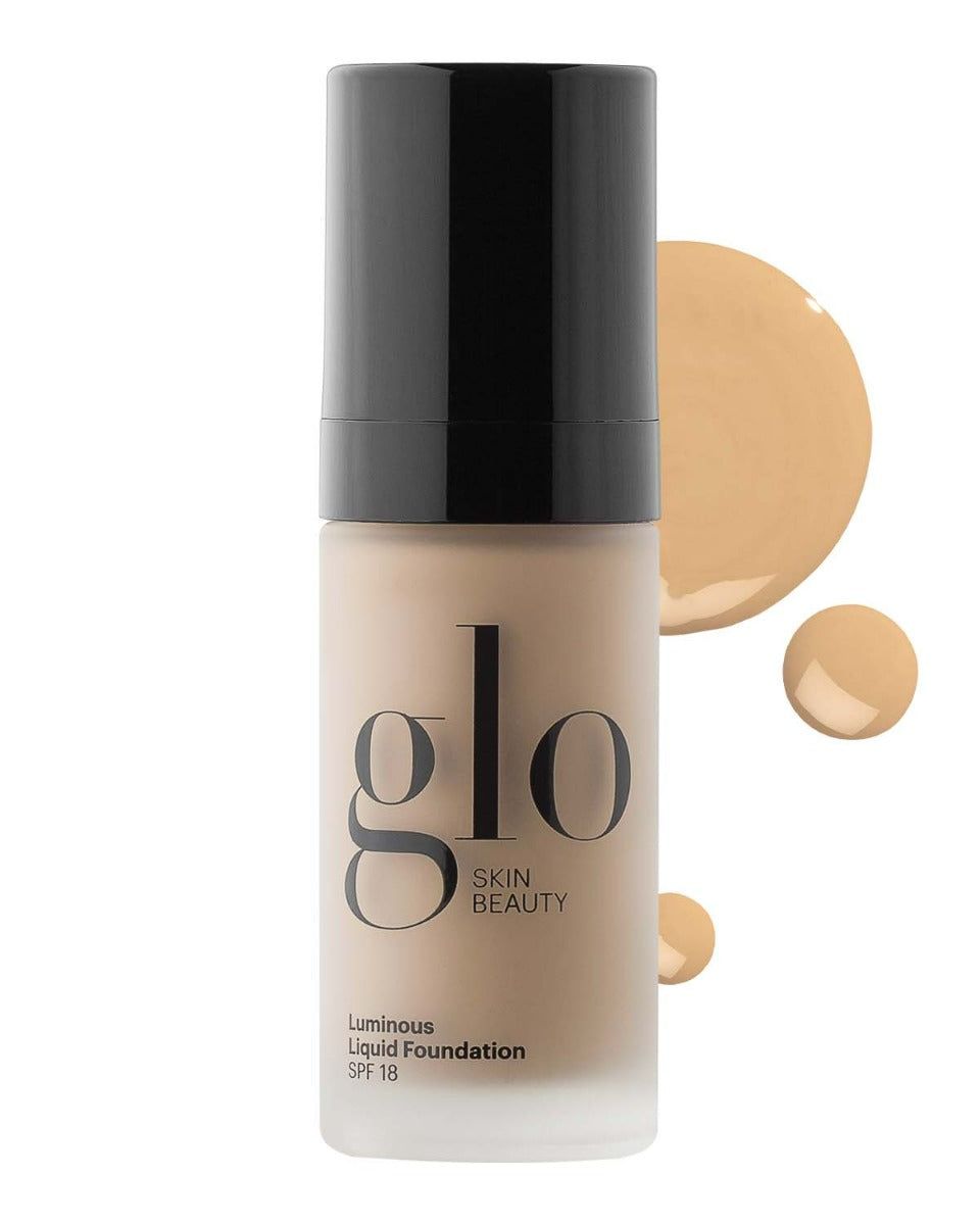 Glo Skin Beauty ŠVYTĖJIMO SUTEIKIANTIS SKYSTAS MAKIAŽO PAGRINDAS SU SPF 18 / LUMINOUS LIQUID FOUNDATION SPF 18 TAHINI